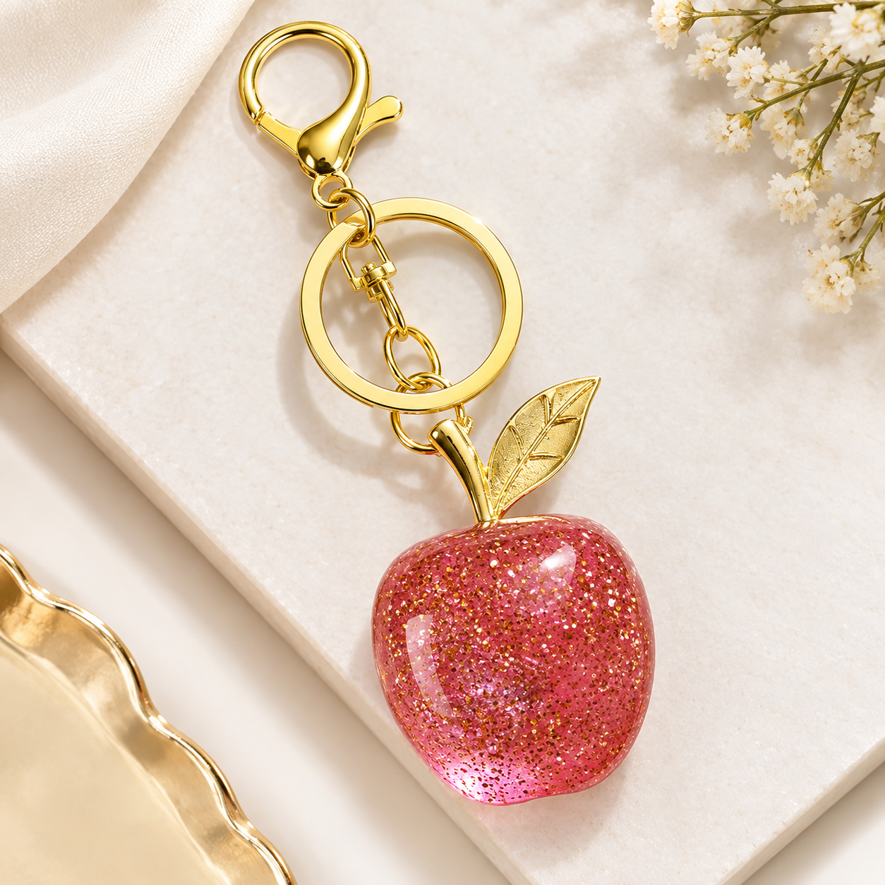 Gold pembe elma charm Pembe