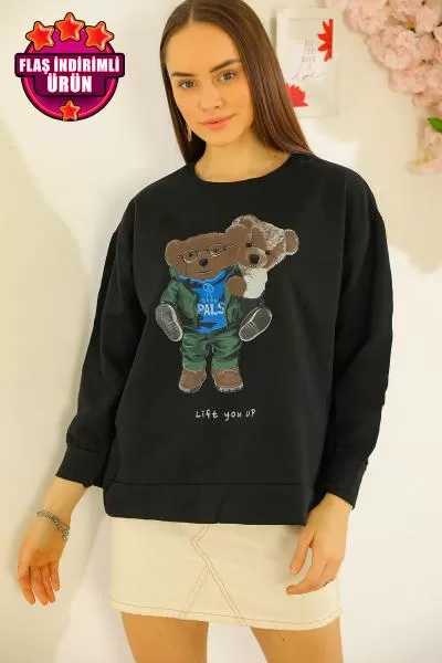 https://customers.birissine.com/public/uploads/product_gallery/baskili-oversize-sweat-siyah-3349.webp