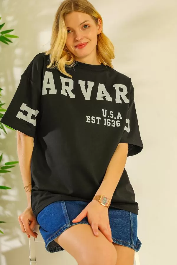 https://customers.birissine.com/public/uploads/product_gallery/baskili-oversize-t-shirt-siyah-15695.webp