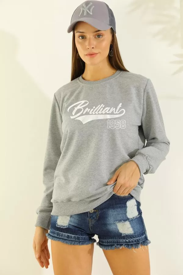 https://customers.birissine.com/public/uploads/product_gallery/baskili-sweat-gri-5133.webp