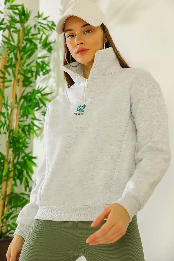 https://customers.birissine.com/public/uploads/product_gallery/fermuarli-dikis-detayli-sweat-gri-9898.webp