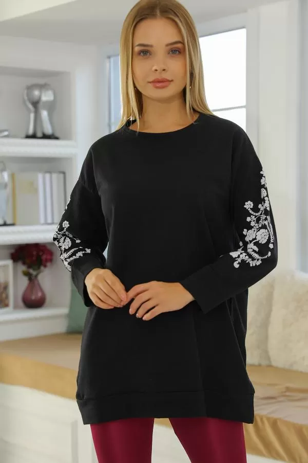 https://customers.birissine.com/public/uploads/product_gallery/kol-detayli-spor-tunik-siyah-15402.webp