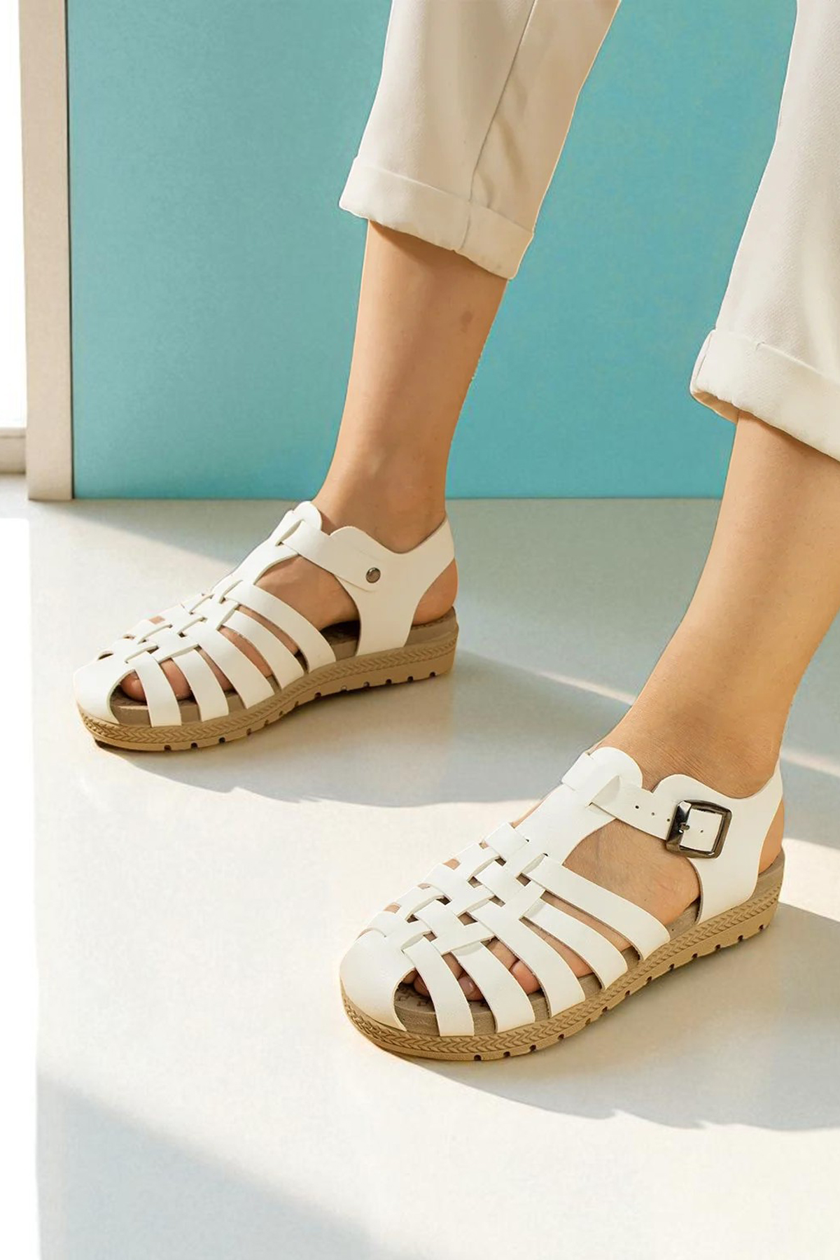 https://customers.birissine.com/public/uploads/product_gallery/onu-kapali-hafif-hasir-taban-tokali-kadin-sandalet-beyaz2jpg-birissine-c9afe5c7626e.jpg