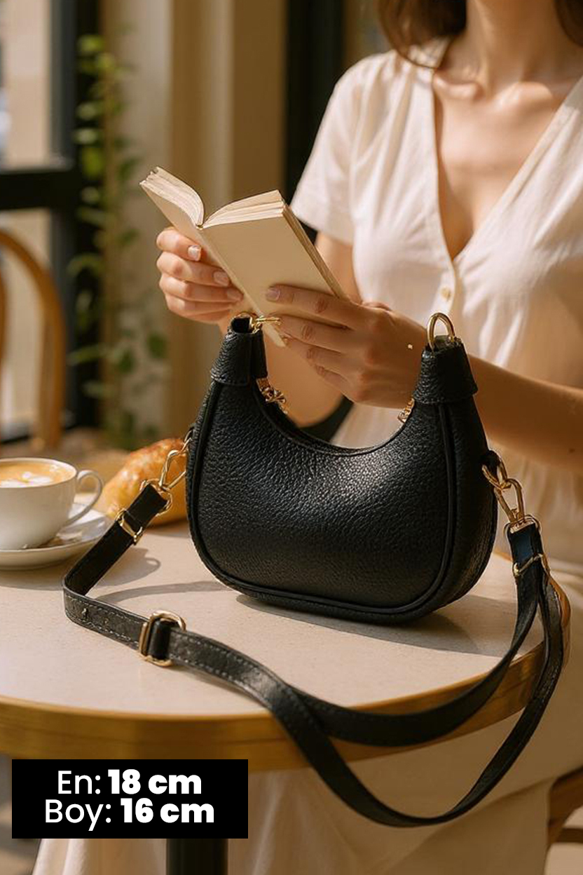 https://customers.birissine.com/public/uploads/product_gallery/siyah-kadin-canta1jpg-birissine-e05288e6161-birissine-1752561759b.jpg