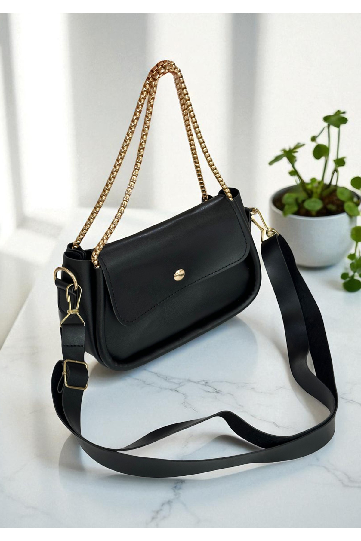 https://customers.birissine.com/public/uploads/product_gallery/zincirli-kadin-omuz-cantasi-1jpg-birissine-20dd14ea21d0.jpg